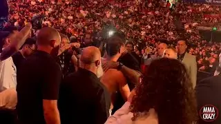 Mauricio Ruffy embraces Carlos Prates after TKO win over Rafael Fiziev at UFC 325