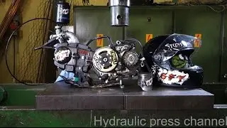 Crushing running 4-stroke motor and motorcycle helmet with hydraulic press