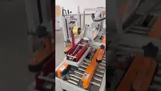 Automatic packing machine. Automatic carton flaps folding sealing machine.