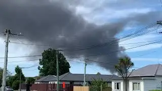 Black smoke drifts across city from a fire at Christchurch&rsquo;s wastewater treatment plant in Bromley