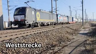 Beaconrail Vectron + DPB Vectron mit einem G&uuml;terzug auf der Weststrecke