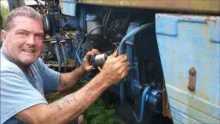 How to replace the starter on a 2000 series Long tractor. It's not as easy as it looks. Ford tractor