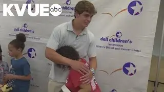 Arch Manning surprises kids at Dell Children's Hospital