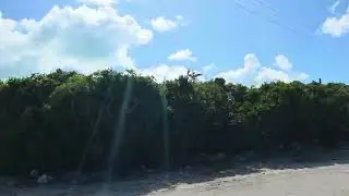 111925 Golf Car ride from Pirate Trap Beach access, Staniel Cay, Bahamas, on path to a 