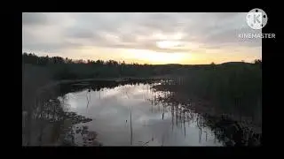 Drone shot moody sunset river
