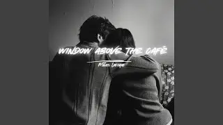The Girl in the Window Seat