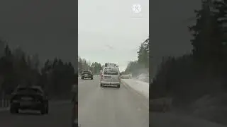 Driving Behide Two Big Snow Machines