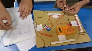 Physics project: Fabrication and study of homemade capacitor