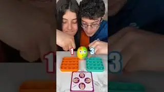 Couples playing Stress buster pop it game #couple#satisfying #challenge #boardgames #stressrelief