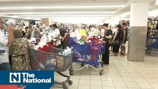 Israelis form long queues in supermarkets and Gaza under 'complete siege'