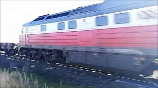 232 005-9 mit kleinem G&uuml;terzug bei Wust
