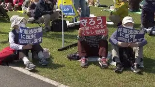 Japanese people protest against move to amend pacifist constitution