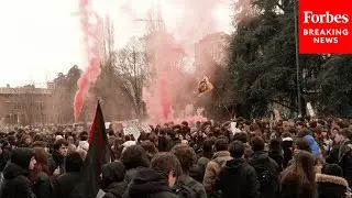 Protesters In Milan Rally Against Planned Presence Of ICE Officers At The Olympics