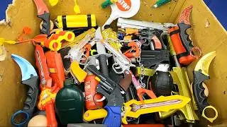 Box Full of Toy Weapons & Spy Gear! Revolvers, AKs, Knives, Dynamite, Grenades & More!