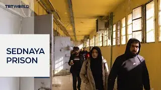 Сирийские семьи штурмуют печально известную тюрьму Седная