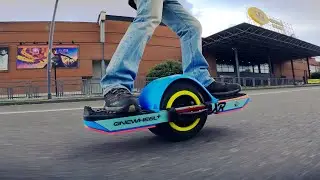 Riding Onewheel in front a movie cinema of my city