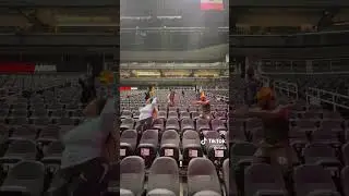 Ciara doing the Drop Your Love dance with her Out Of This World Tour dancers in the arena stands