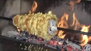 Fabrication gâteaux à la broche au feu de bois