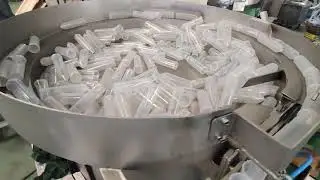large plastic tube feeder in horizontal orientation