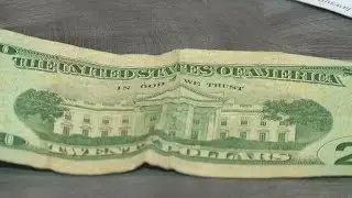 Atheist group wants 'God' removed from currency
