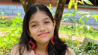 POOPARIKAN KODE VA. Malayalam light music recitation by Keziah Mary Johnson.