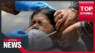 Mass cremations in India as COVID-19 death toll nears 205,000