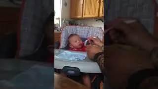 Pablo eating peaches