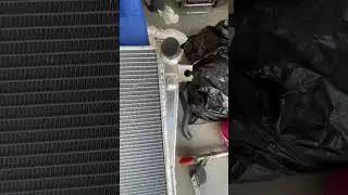 Aluminum radiator from Amazon for pre 9/87 BMW E30 with manual transmission. Hope it lasts! 🤞