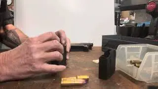 Loading a Super Short 6 5 Round Magazine