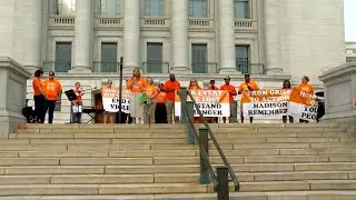 People gather at State Capitol for candlight vigil for gun violence victims