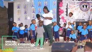 Kinder one on stage.  Shiloh School megga concert 2025