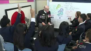 Veteran passes on life lessons to young students