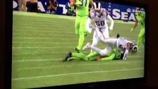 Seattle Seahawk's punter Jon Ryan fake punt, huge hit.