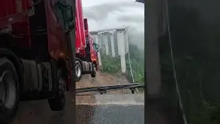 Bridge Collapse in Guizhou: Semi Truck Dangling Off Cliff in Rainstorm | 贵州暴雨中桥塌，红色大货车悬空半挂悬崖 #truck
