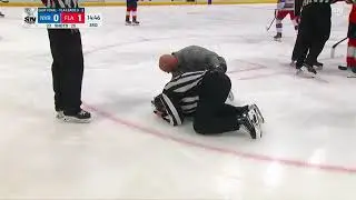 Referee takes a puck to the nuts!!!!