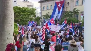 Large crowd gathers for protest in Downtown Miami outside Freedom Tower
