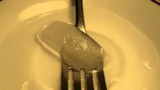 An ice cube un-melting in 24 seconds. (In HD)