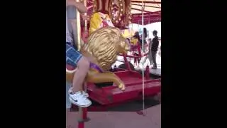 Fair!! On A Carousel ridw at the fair...