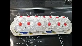 Brazo de gitano con crema y merengue