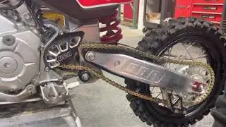 BBR Shifter Shaft Support Brace and Sprocket Guard for the CRF110