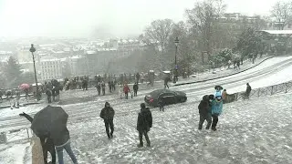 Views from Montmartre show Paris covered in snow | AFP