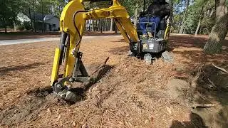New Holland E17c stump removal 