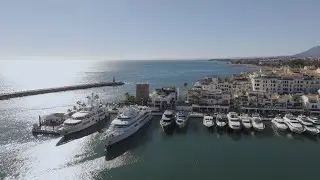Marbella Puerto Banus in Spain, Andalusia, Malaga by drone 4K (Yachts in Puerto Ban&uacute;s)