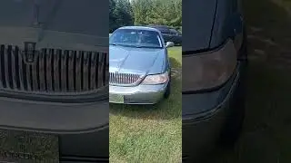 Lincoln Town car on 24 inch rims