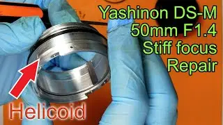 Repairing stiff focus on Yashinon DS-M 50mm F1.4 lens.