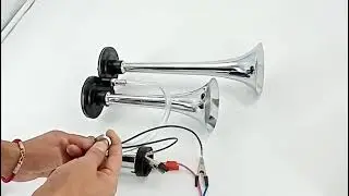 Dual trumpet air horn with pump loud