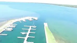 Drone video heading west over Tawas Bay along the dropoff.