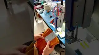 Tagging machine for gloves.
