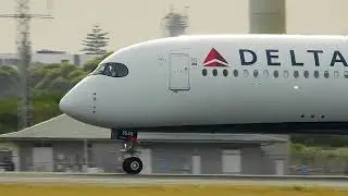 DELTA A350 landing in Sydney Super Zoom closeup of nose touchdown with Nikon P950