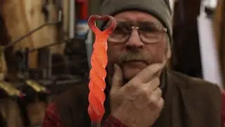 Forged fire poker with Heart Finial